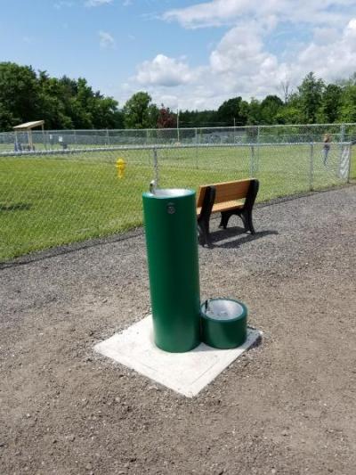 bench and water fountain