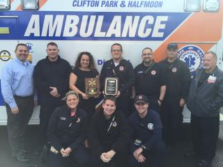 CP/HM Ambulance Corp with award